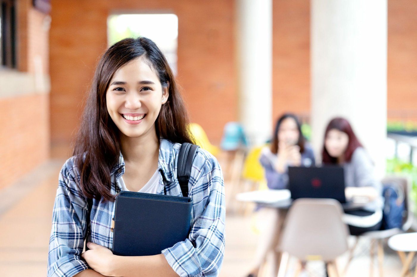 A DACA recipient attends school.